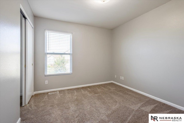 6961 N 89th Ave, Omaha, NE 68122 - unfurnished bedroom with carpet and a closet