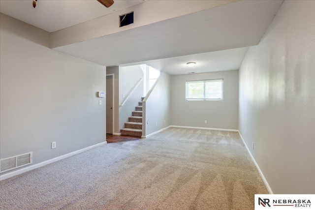 6961 N 89th Ave, Omaha, NE 68122 - spare room with carpet floors and stairs