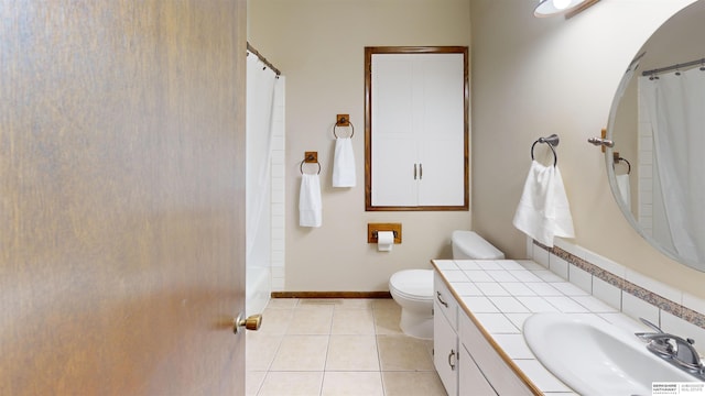10912 V St, Omaha, NE 68137 - bathroom with vanity, tile patterned floors, and shower / bath combo with shower curtain
