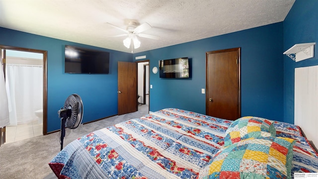 10912 V St, Omaha, NE 68137 - bedroom featuring carpet flooring, ceiling fan, a textured ceiling, and connected bathroom