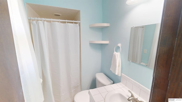 10912 V St, Omaha, NE 68137 - bathroom featuring vanity and a shower with shower curtain