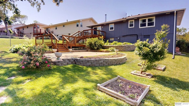 10912 V St, Omaha, NE 68137 - back of house featuring a garden, a deck, a patio, and stairs