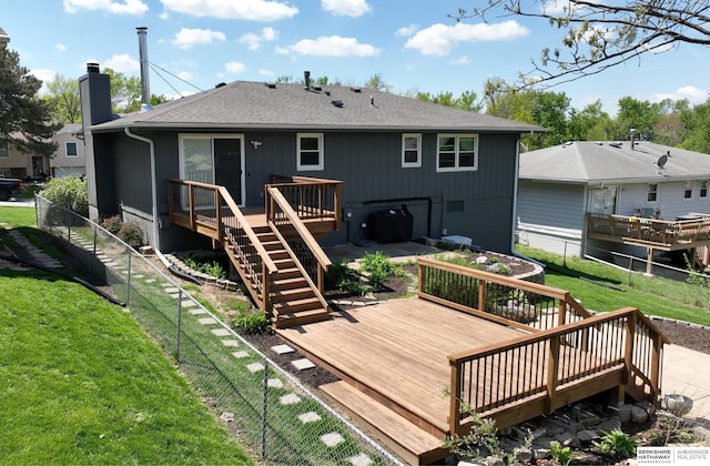 10912 V St, Omaha, NE 68137 - back of house featuring a fenced backyard, a wooden deck, stairs, and a chimney