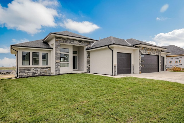 5608 N 212th St, Elkhorn, NE 68022 - prairie-style home featuring stone siding, a garage, driveway, a front yard, and roof with shingles