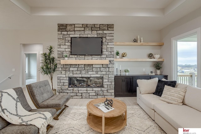 5608 N 212th St, Elkhorn, NE 68022 - living room with light wood-type flooring and a fireplace