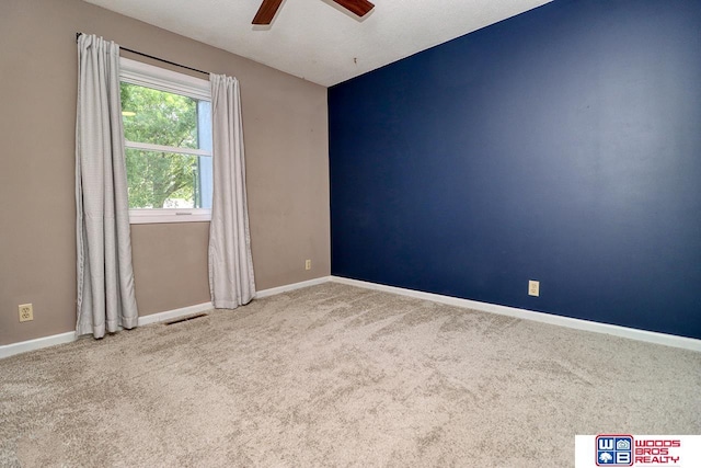 5951 Oakridge Dr, Lincoln, NE 68516 - unfurnished room featuring ceiling fan and carpet