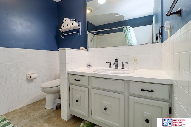 5951 Oakridge Dr, Lincoln, NE 68516 - bathroom featuring tile walls, vanity, a shower with curtain, and tile patterned flooring
