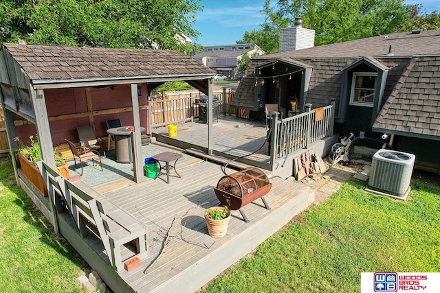 5951 Oakridge Dr, Lincoln, NE 68516 - deck featuring an outdoor fire pit