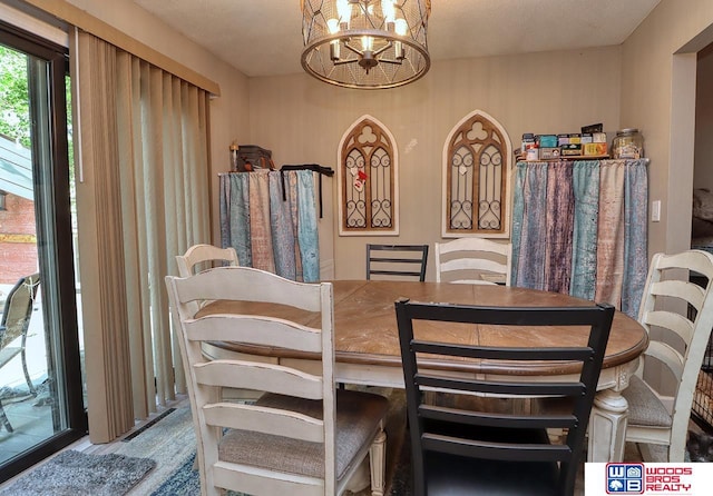 5951 Oakridge Dr, Lincoln, NE 68516 - dining room featuring a chandelier