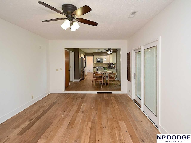 724 N 155th Ave, Omaha, NE 68154 - unfurnished room featuring ceiling fan and light wood-type flooring