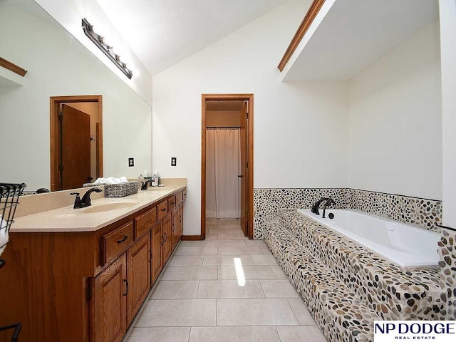 724 N 155th Ave, Omaha, NE 68154 - bathroom with vaulted ceiling, double vanity, a bath, and tile patterned flooring