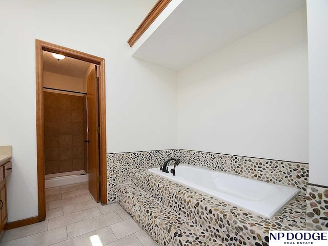 724 N 155th Ave, Omaha, NE 68154 - full bath with vanity, a garden tub, and tile patterned flooring