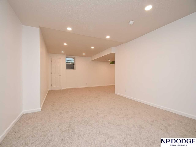 724 N 155th Ave, Omaha, NE 68154 - finished basement with carpet flooring and recessed lighting