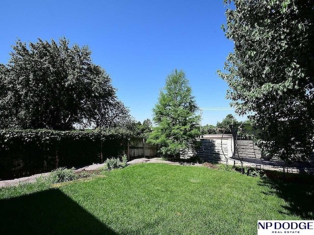 724 N 155th Ave, Omaha, NE 68154 - view of yard featuring a trampoline