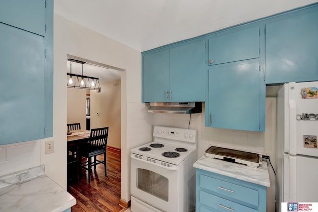 6336 N 37th St, Omaha, NE 68111 - kitchen with white appliances, under cabinet range hood, blue cabinets, backsplash, and dark wood-type flooring