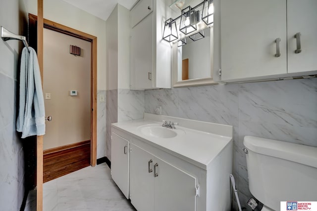 6336 N 37th St, Omaha, NE 68111 - bathroom with marble finish floors and vanity