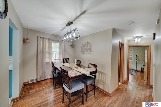 6336 N 37th St, Omaha, NE 68111 - dining room with light wood-type flooring and baseboards