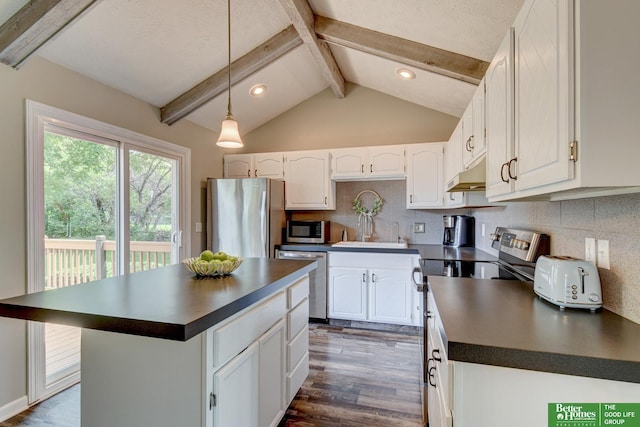 11122 Jefferson St, Omaha, NE 68137 - kitchen featuring appliances with stainless steel finishes, dark countertops, under cabinet range hood, dark wood-style floors, and recessed lighting