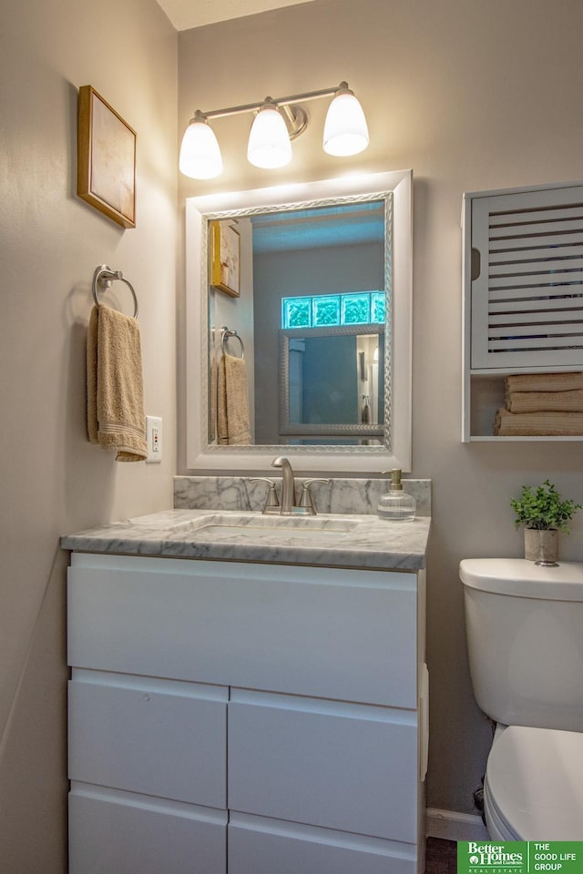 11122 Jefferson St, Omaha, NE 68137 - bathroom with vanity and toilet