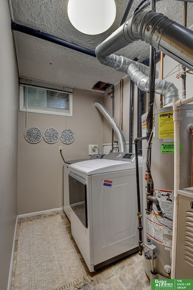 11122 Jefferson St, Omaha, NE 68137 - washroom featuring washing machine and dryer and gas water heater