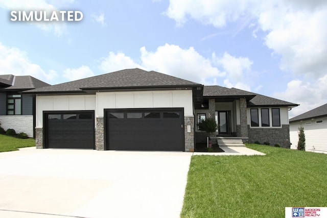 941 N 104th St, Lincoln, NE 68527 - prairie-style house with an attached garage, stone siding, a shingled roof, and driveway