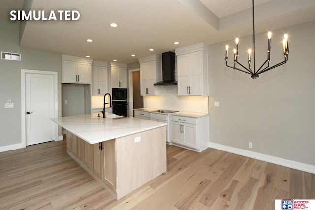 941 N 104th St, Lincoln, NE 68527 - kitchen featuring wall chimney exhaust hood, black appliances, a chandelier, decorative backsplash, and recessed lighting