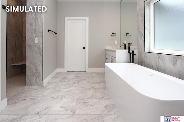 941 N 104th St, Lincoln, NE 68527 - full bath featuring a freestanding bath, vanity, marble finish flooring, and walk in shower