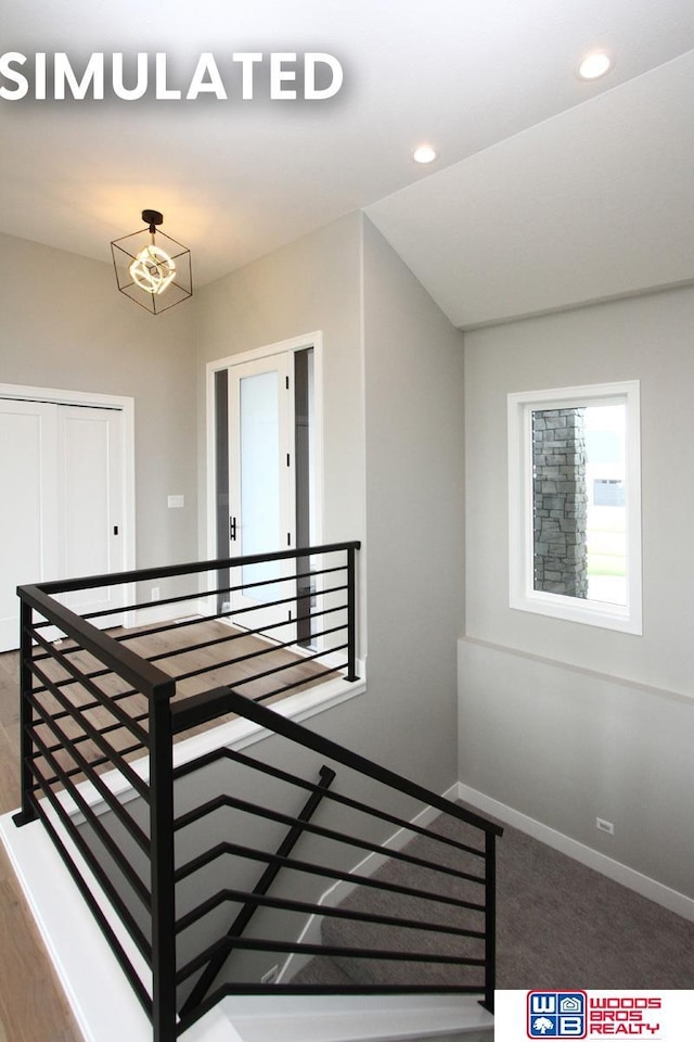 941 N 104th St, Lincoln, NE 68527 - stairway with baseboards and recessed lighting