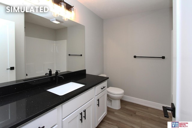 941 N 104th St, Lincoln, NE 68527 - full bath featuring wood finished floors and vanity