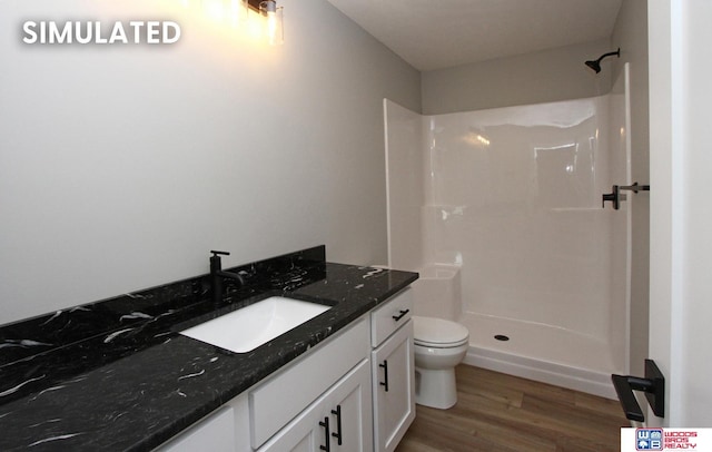 941 N 104th St, Lincoln, NE 68527 - bathroom with vanity, a shower, and wood finished floors