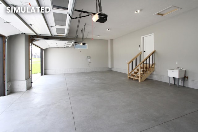 941 N 104th St, Lincoln, NE 68527 - garage featuring a garage door opener