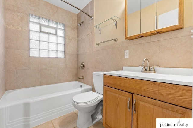 3052 S 46th Ave, Omaha, NE 68106 - full bath featuring tile walls, shower / tub combination, vanity, and tile patterned flooring