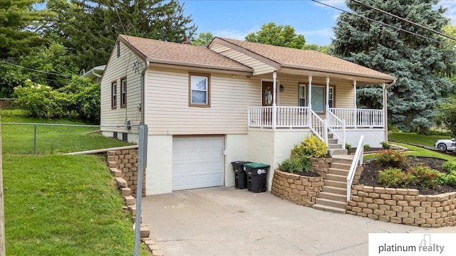 3052 S 46th Ave, Omaha, NE 68106 - ranch-style house with covered porch, driveway, an attached garage, stairway, and a shingled roof