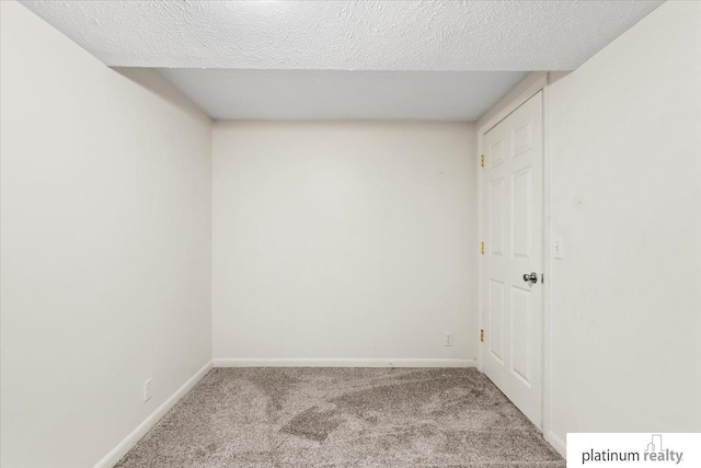 3052 S 46th Ave, Omaha, NE 68106 - carpeted spare room with a textured ceiling
