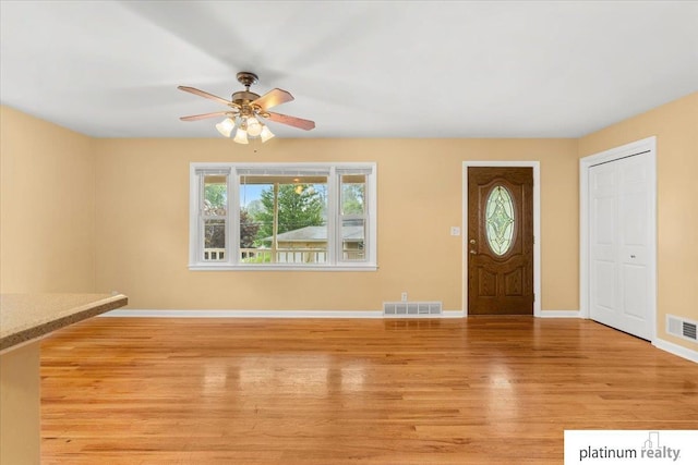 3052 S 46th Ave, Omaha, NE 68106 - entryway featuring light wood finished floors and ceiling fan