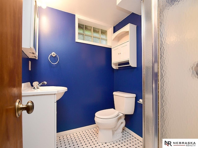 7626 S 41st St, Bellevue, NE 68147 - bathroom featuring baseboards and vanity