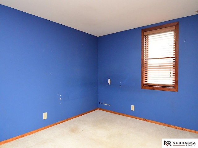 7626 S 41st St, Bellevue, NE 68147 - unfurnished room featuring carpet flooring and baseboards