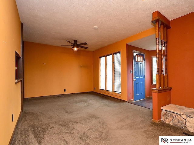 7626 S 41st St, Bellevue, NE 68147 - carpeted spare room with a ceiling fan, a textured ceiling, and a smoke detector