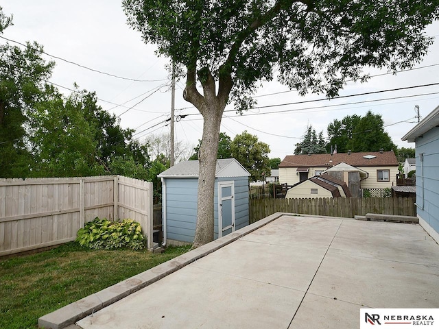 7626 S 41st St, Bellevue, NE 68147 - fenced backyard featuring a patio and a storage shed