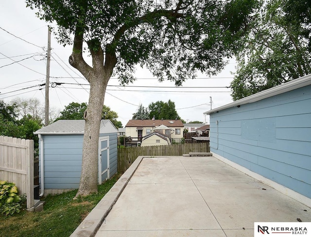 7626 S 41st St, Bellevue, NE 68147 - view of patio featuring a shed