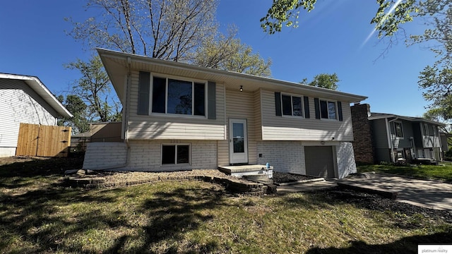6361 S 140th Ave, Omaha, NE 68137 - rear view of house featuring an attached garage and brick siding