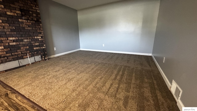 6361 S 140th Ave, Omaha, NE 68137 - spare room featuring carpet flooring and baseboards