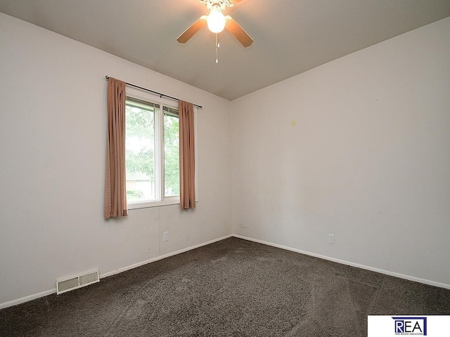 1312 N 148th Plz, Omaha, NE 68154 - spare room with ceiling fan, dark colored carpet, and lofted ceiling