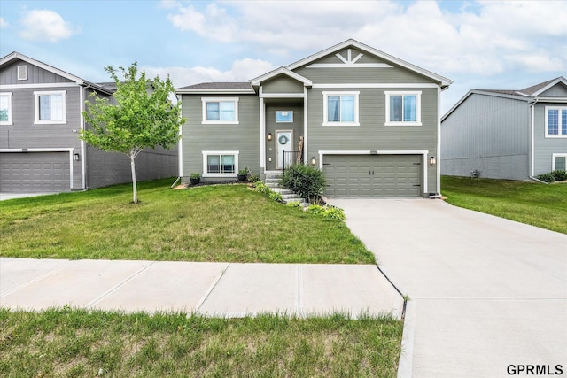 7794 N 88th St, Omaha, NE 68122 - split foyer home with an attached garage, concrete driveway, and a front yard