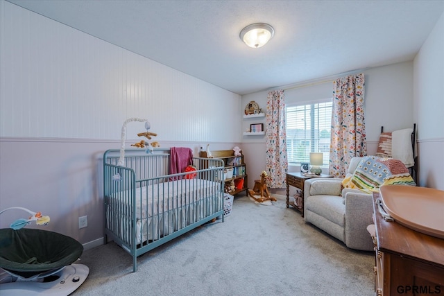 7794 N 88th St, Omaha, NE 68122 - bedroom featuring carpet floors and a crib