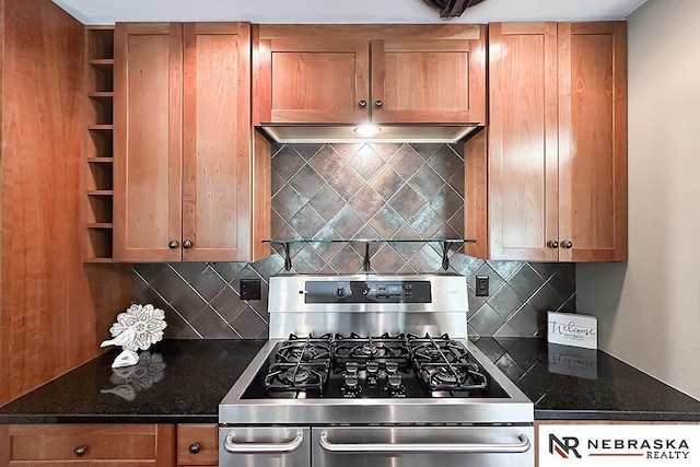 437 S 90th St, Omaha, NE 68114 - kitchen featuring gas range, decorative backsplash, and dark stone counters