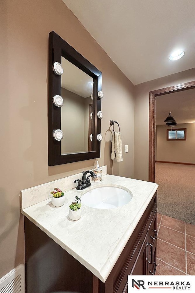 437 S 90th St, Omaha, NE 68114 - bathroom featuring vanity and tile patterned floors