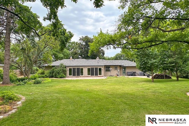 437 S 90th St, Omaha, NE 68114 - rear view of house featuring a yard