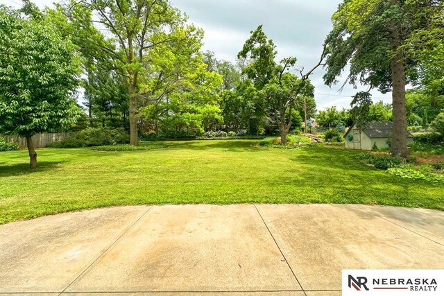 437 S 90th St, Omaha, NE 68114 - view of grassy yard with a patio