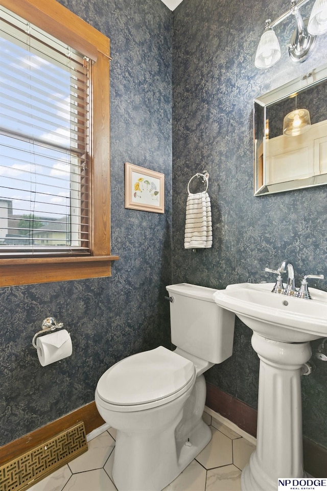 4340 Miami St, Omaha, NE 68104 - half bath with toilet and tile patterned floors
